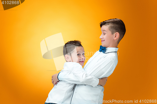Image of Happy children playfully fighting