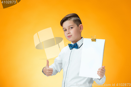 Image of Happy boy showing thumbs up sign OK