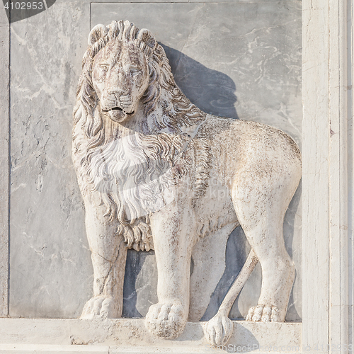 Image of Marble lion on church facade