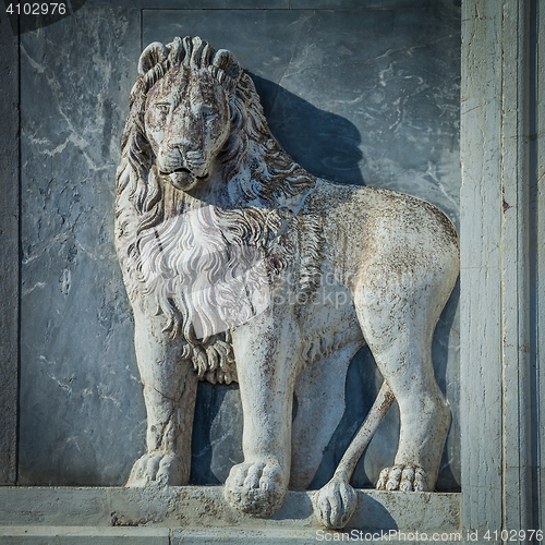 Image of Marble lion on church facade