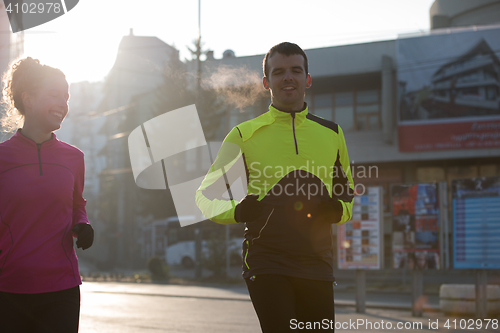 Image of young  couple jogging