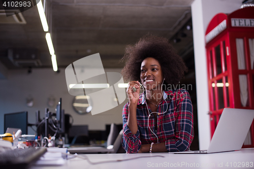 Image of portrait of a young successful African-American woman in modern 