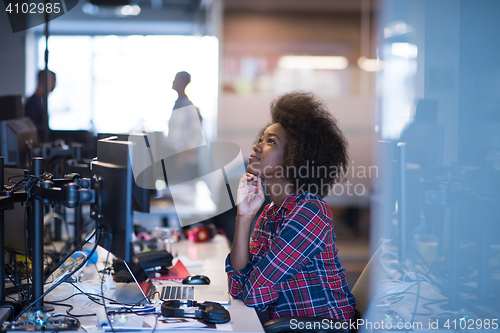 Image of portrait of a young successful African-American woman in modern 