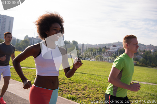 Image of multiethnic group of people on the jogging