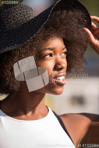 Image of Close up portrait of a beautiful young african american woman sm