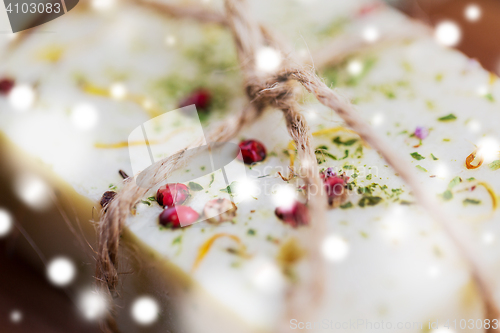 Image of close up of handmade soap bars on wood