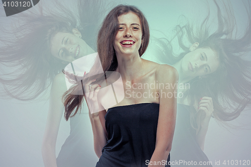 Image of The young woman\'s portrait with happy emotions