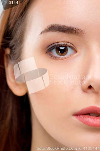 Image of The face of woman on gray background