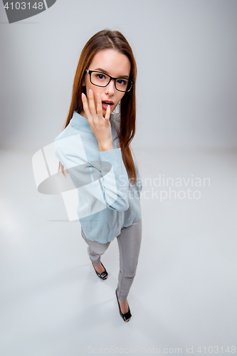 Image of The young business woman on gray background