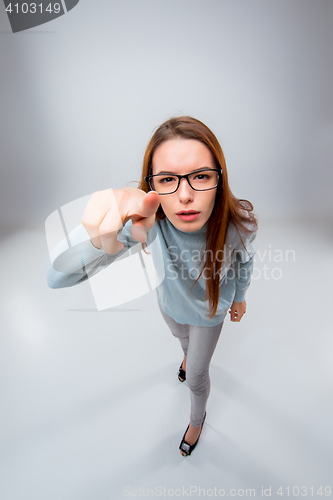 Image of The young business woman on gray background