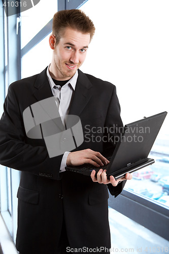 Image of Businessman with laptop
