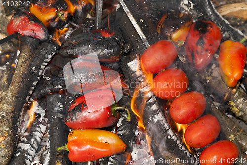 Image of fried vegetables on a fire