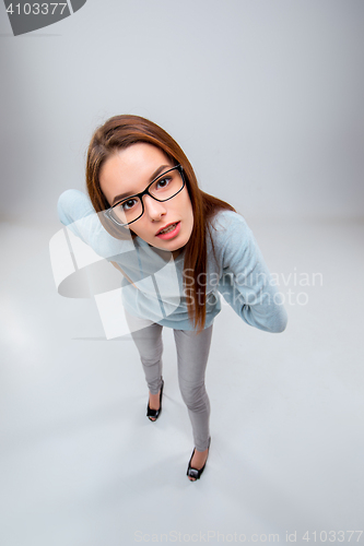 Image of The young business woman on gray background