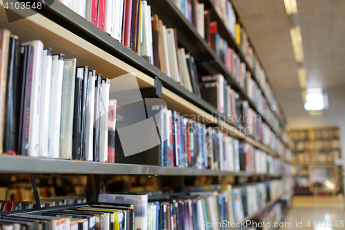 Image of bookshelves with books at school library