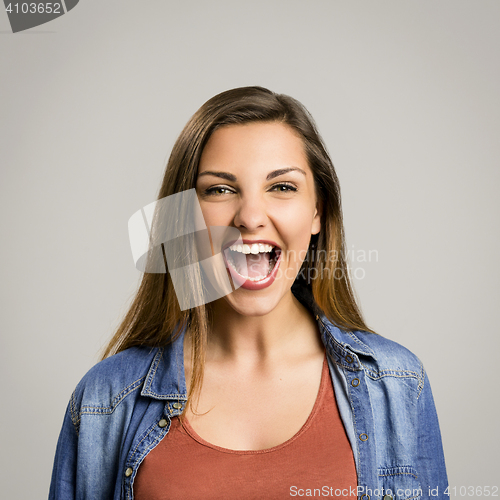 Image of Happy woman laughing