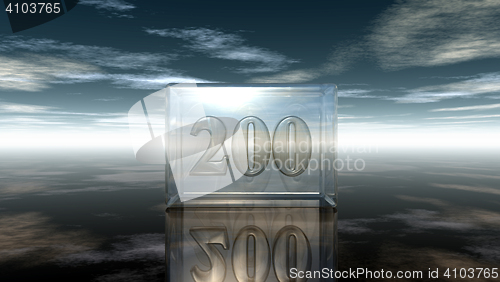 Image of number two hundred in glass cube under cloudy sky - 3d rendering