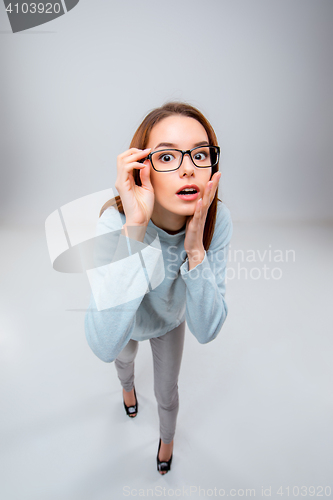 Image of The young business woman on gray background