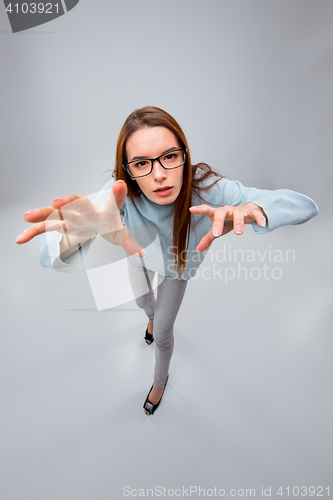 Image of The young business woman on gray background