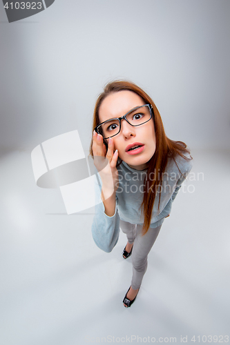 Image of The young business woman on gray background