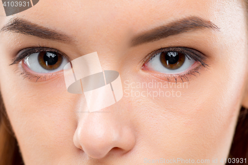 Image of The face of woman on gray background
