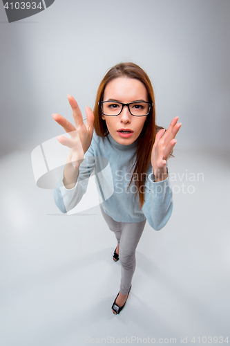 Image of The young business woman on gray background