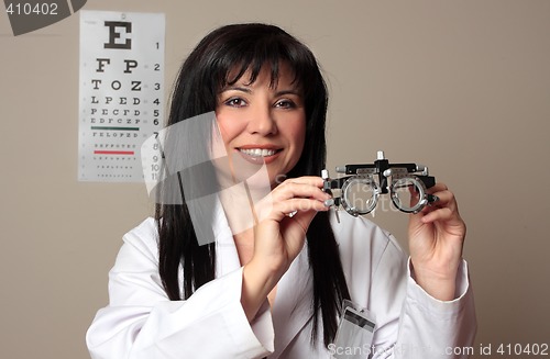 Image of Eye doctor with trial frames