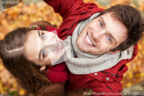 Image of close up of happy couple taking selfie at autumn
