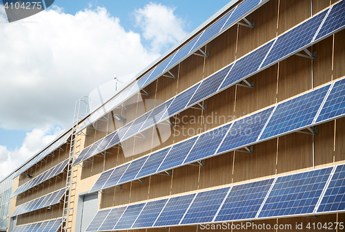 Image of solar battery panels on building facade