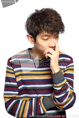 Image of  young thoughtful man isolated over white background