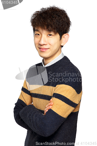 Image of happy asian man with arms folded