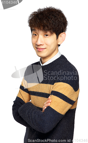 Image of happy asian man with arms folded