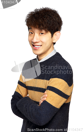 Image of happy asian man with arms folded