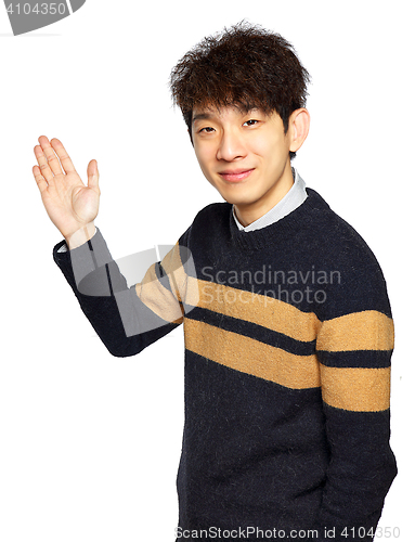 Image of Asian young business man hold show open empty palm