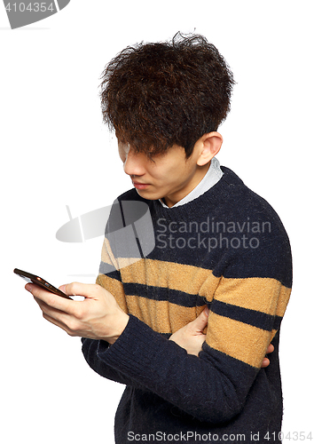 Image of young asia man texting on mobilephone