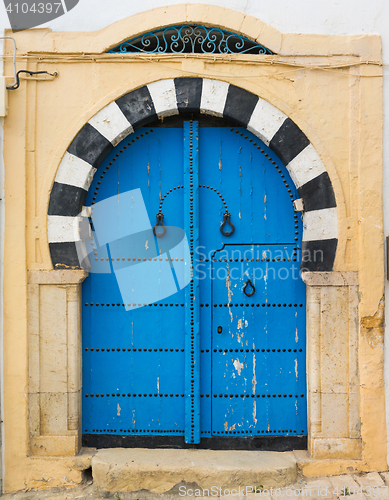 Image of Traditional blue arched door from Sidi Bou Said