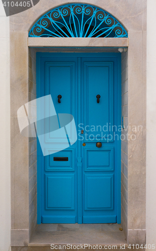 Image of Blue wooden door with arch from Sidi Bou Said