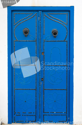 Image of Traditional Blue door with ornament from Tunisia 