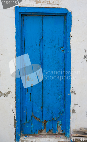 Image of Blue aged door from Sidi Bou Said in Tunisia