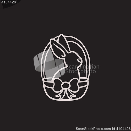 Image of Easter bunny sitting in basket sketch icon.