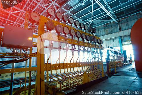 Image of Equipment, cables and piping as found inside of a modern industr