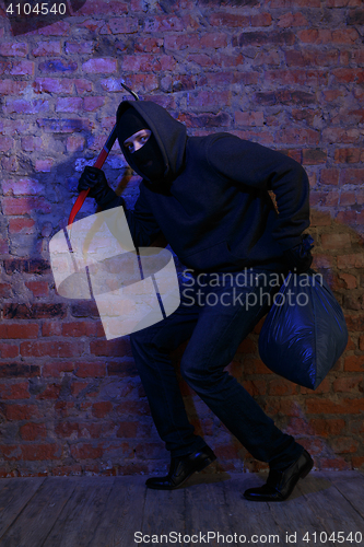 Image of Thief with bag and pickaxe