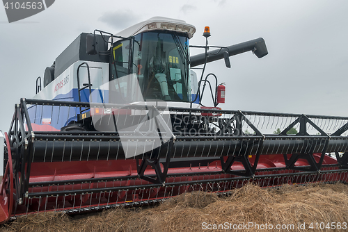 Image of New harvester stands on an exhibition platform