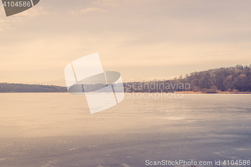 Image of Sunrise over a frozen lake