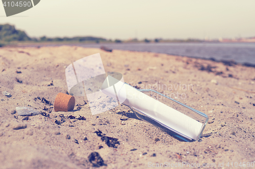 Image of Message in a bottle on a beach