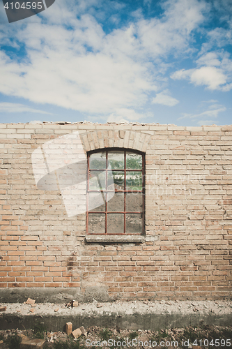 Image of Old window on a wall