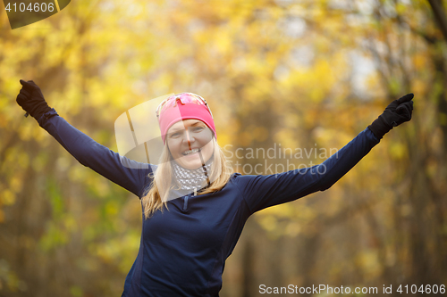 Image of Girl doing exercises in forest