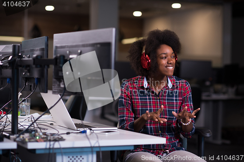 Image of portrait of a young successful African-American woman in modern 