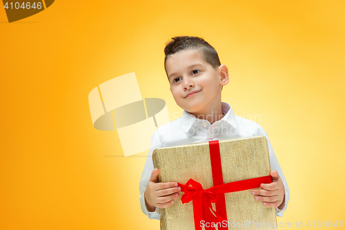 Image of The boy with gift box