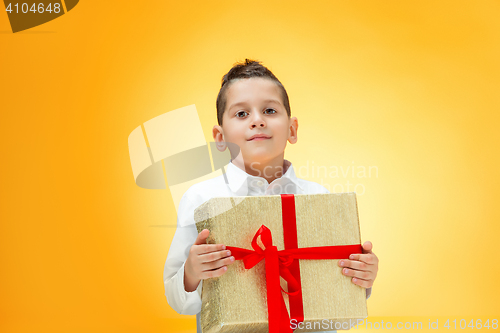 Image of The boy with gift box