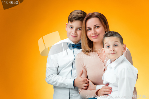 Image of Happy mother and two sons